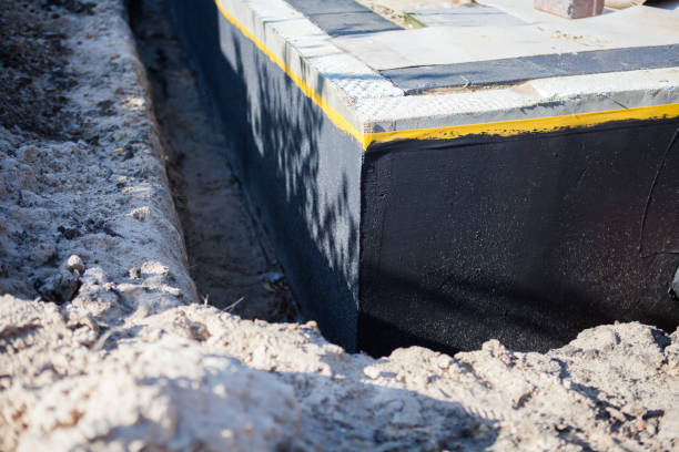Professional Interior Drainage System technician working in Warren, OR